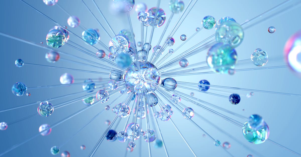 blog.drhariz.com A 3D illustration of transparent and iridescent spheres connected by thin rods, radiating outward on a blue background, resembling a molecular structure—ideal for Pakar AI visuals or Dr Hariz’s work in Malaysia. Dr. Muhamad Hariz Adnan