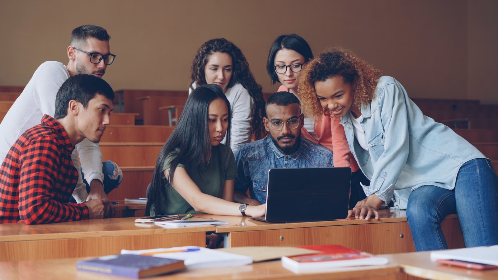Malaysian students using laptops in class, illustrating AI in education in Malaysia