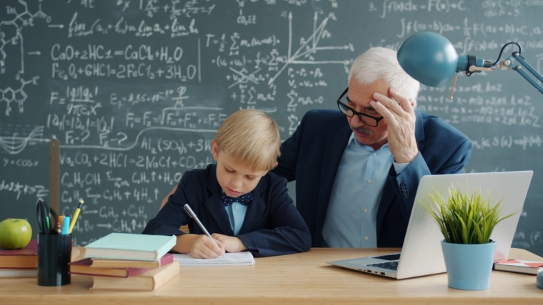 Teacher at a laptop preparing lessons, illustrating ChatGPT for teachers