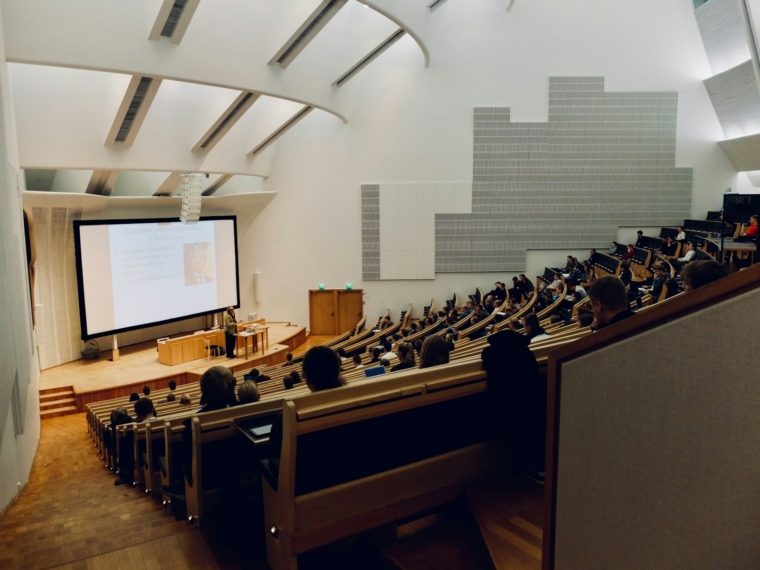 University students using laptops in a lecture hall, illustrating AI in education trends in Malaysia