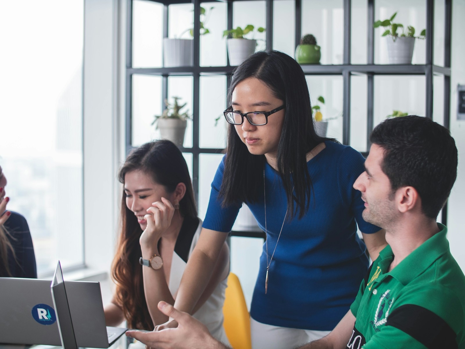 Malaysian business team planning an affordable AI training budget with HRD Corp claim options