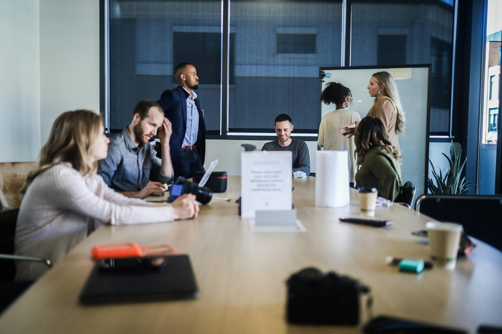 Malaysian sales team reviewing an AI-assisted prospecting and CRM workflow