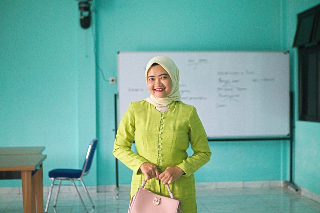 Teacher and students in classroom for AI training private schools Malaysia