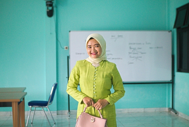 Teacher and students in classroom for AI training private schools Malaysia