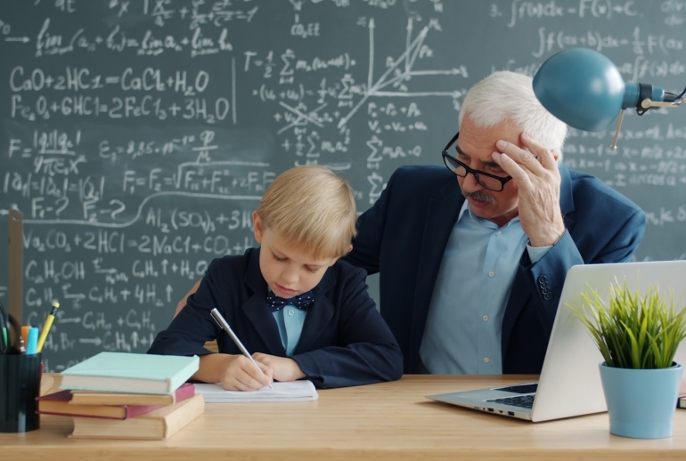 Teacher at a laptop preparing lessons, illustrating ChatGPT for teachers